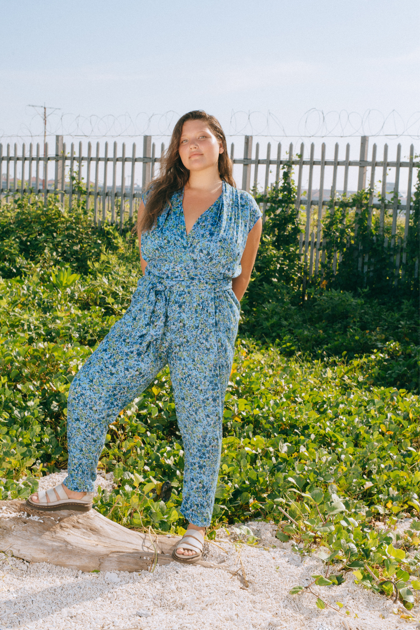 Blue flowery jumpsuit sales
